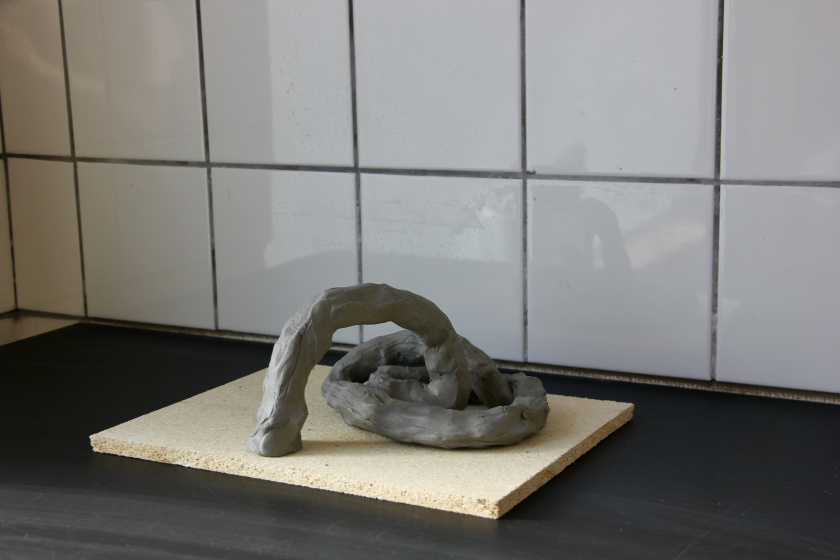 Sculpture in raw stoneware clay, not burnt. By Mattis Rosenbaum.