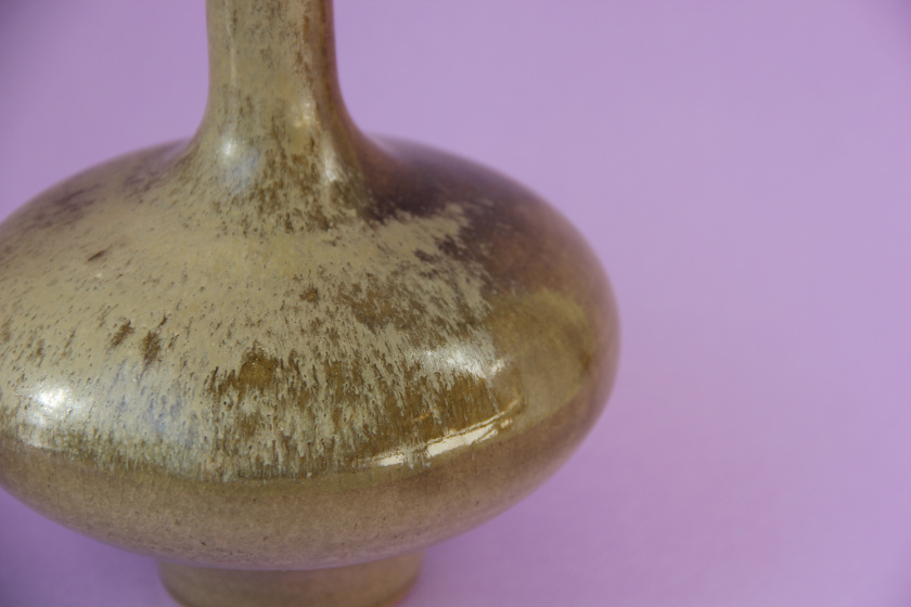 Thrown vase in a green-brown glaze